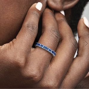 Sparkling Row Sapphire Eternity Ring